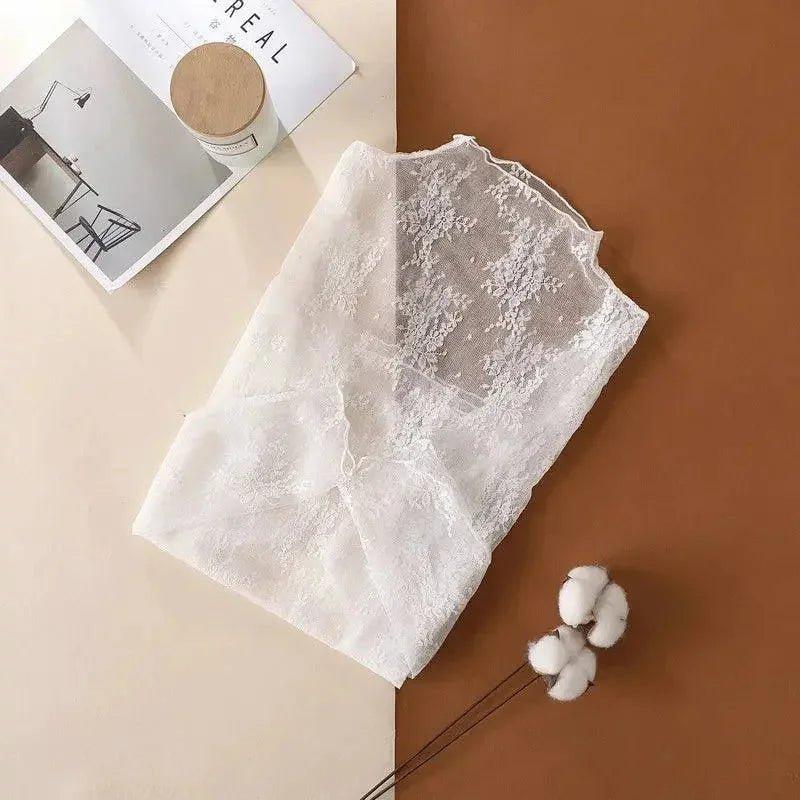 White lace top for women's fashion, delicate floral pattern, styled with cotton buds and magazine
