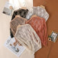Women's sheer lace tops in black, white, blush, and peach — elegant fashion layering pieces
