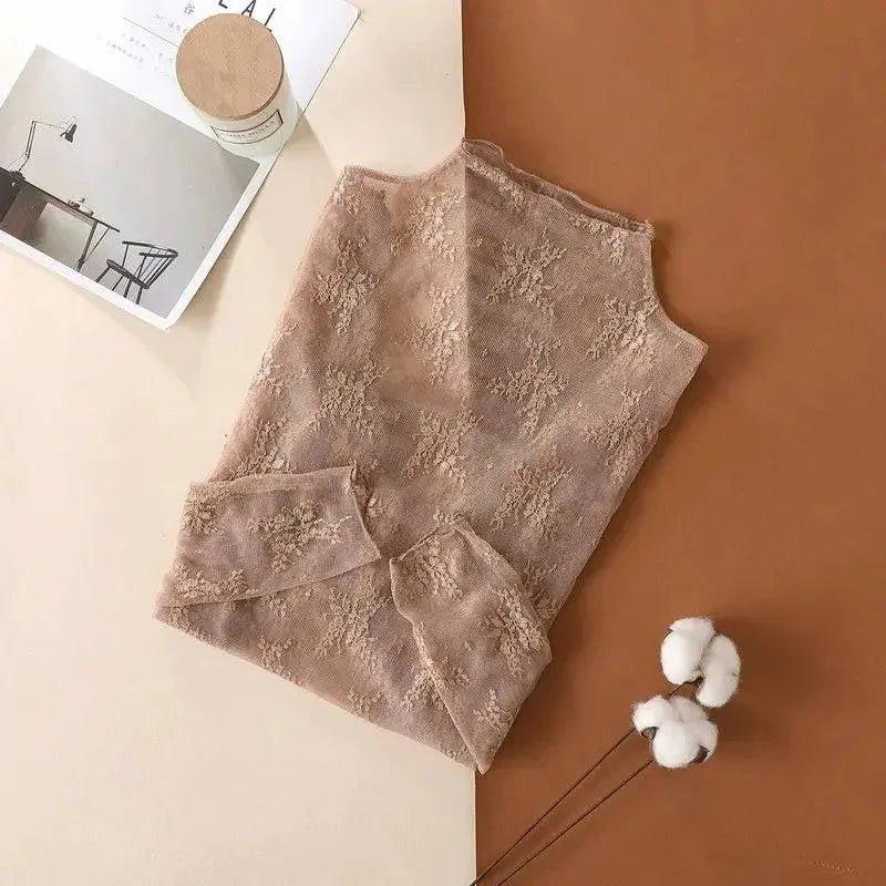 Delicate lace women's sleeveless top, soft beige floral pattern, stylish fashion wear