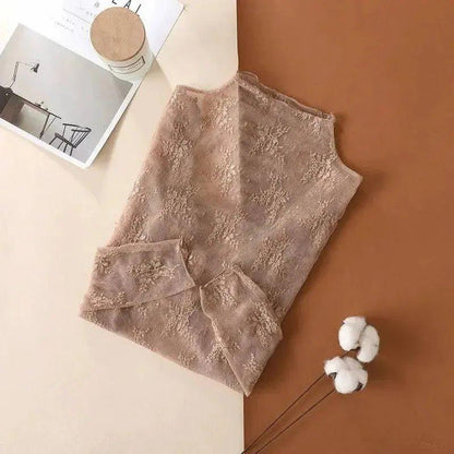 Delicate lace women's sleeveless top, soft beige floral pattern, stylish fashion wear
