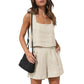 Beige linen women's sleeveless top and shorts set with black woven bag, perfect for summer fashion