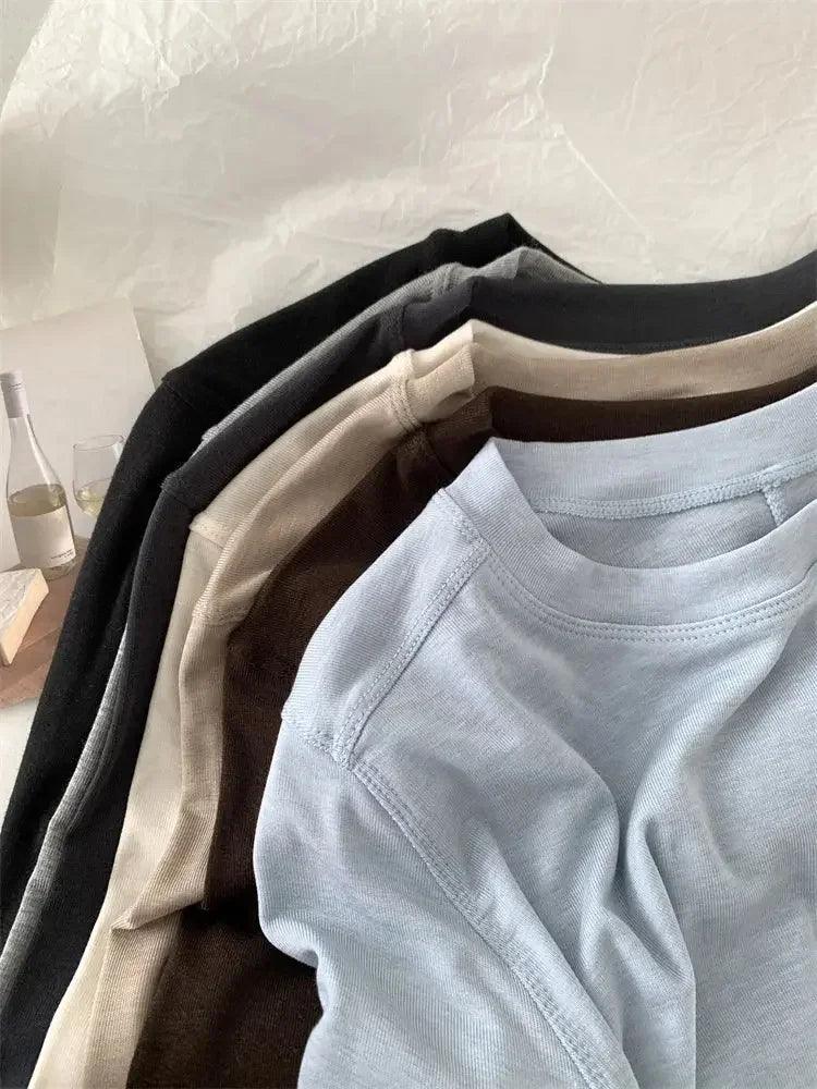Stacked women's basic long sleeve tops in black, gray, beige, brown, and light blue for casual fashion