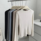 Women's long sleeve tops in neutral colors on clothing rack, fashion essentials for everyday wear