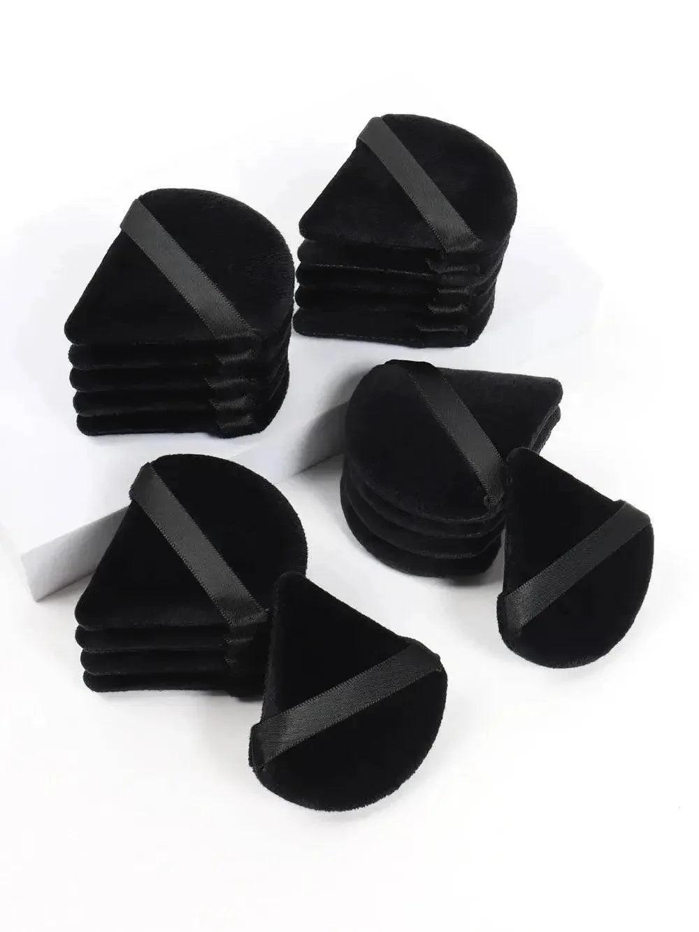 Black velvet makeup sponges with ribbon handles for beauty and fashion routines