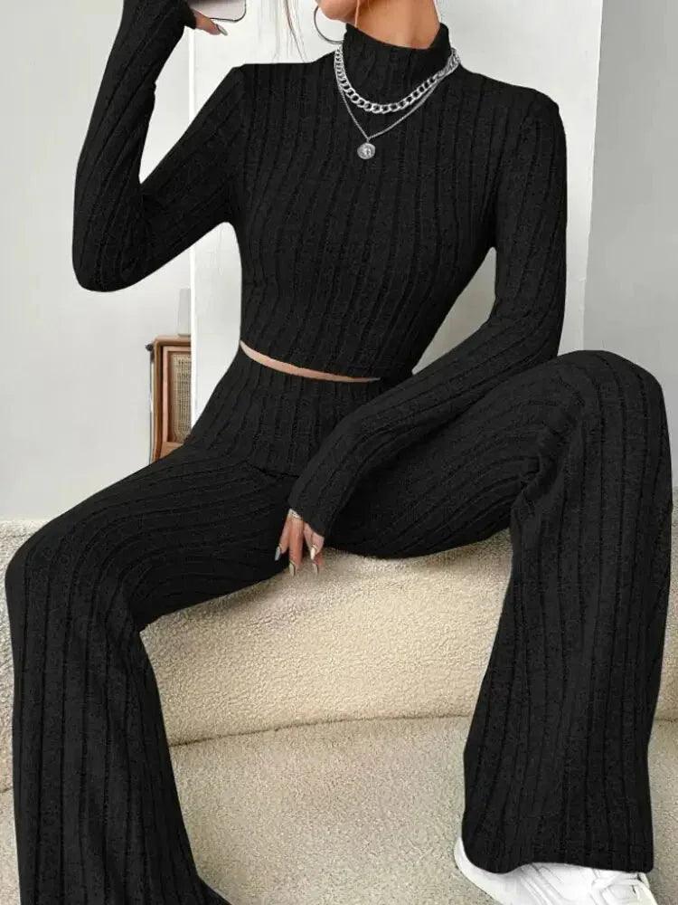 Black ribbed knit women's crop top and wide-leg pants set, stylish fashion outfit
