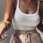 White ribbed tank top with scoop neckline, paired with drawstring waist pants, women's fashion
