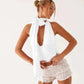 White halter neck top with tie front and ruffled shorts, women's summer fashion outfit