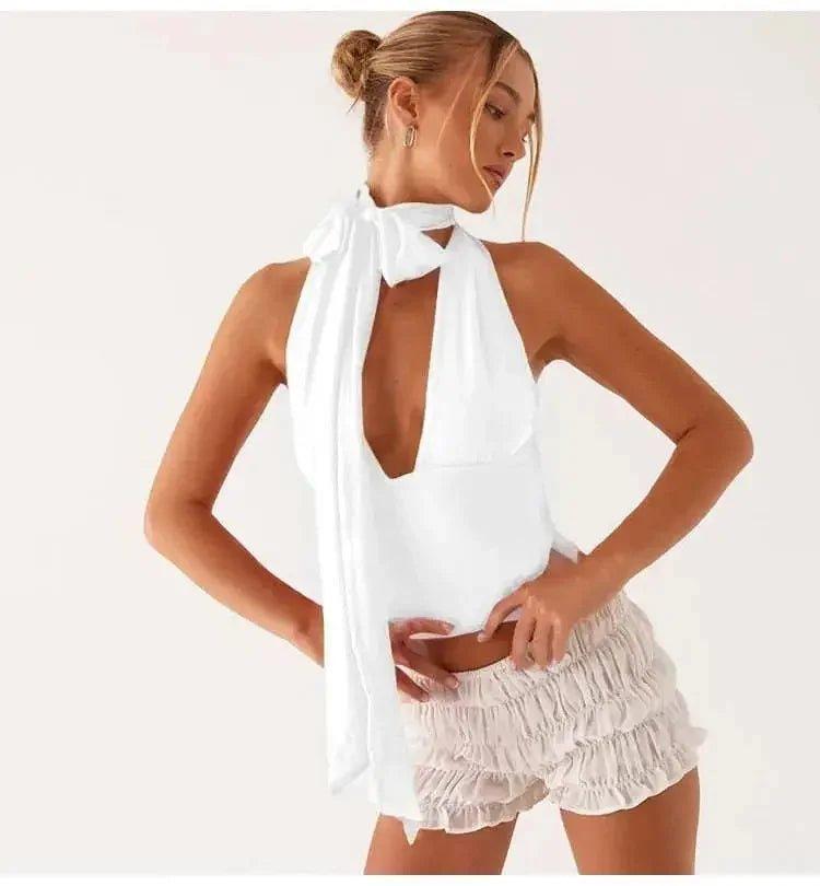 White halter neck top with tie front and ruffled shorts, women's summer fashion outfit