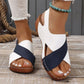 White and navy blue women's wedge sandals with crisscross straps, perfect for summer fashion