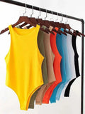 Women's colorful sleeveless bodysuits on hangers, fashion tops for casual wear