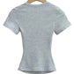 Gray ribbed women's fitted t-shirt with short sleeves, back view on hanger