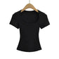 Black women's fitted crop top with square neckline and short sleeves on wooden hanger