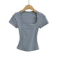 Gray women's short sleeve top with square neckline, stylish fashion tee on hanger