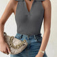 Grey ribbed sleeveless top with collar, paired with jeans and chain bag for women's fashion