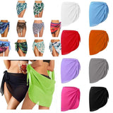 Women's beach cover-up sarongs in tropical prints and solid colors, perfect for swimwear fashion