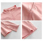 Pink women's zip-up athletic top with high neck, long sleeves, and detailed stitching for fitness wear