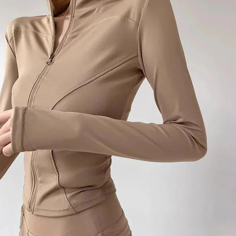 Beige long sleeve zip-up workout top for women, fitness fashion, gym wear, stylish activewear