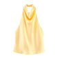 Elegant yellow satin halter neck top for women's fashion, perfect for summer outfits and stylish events.