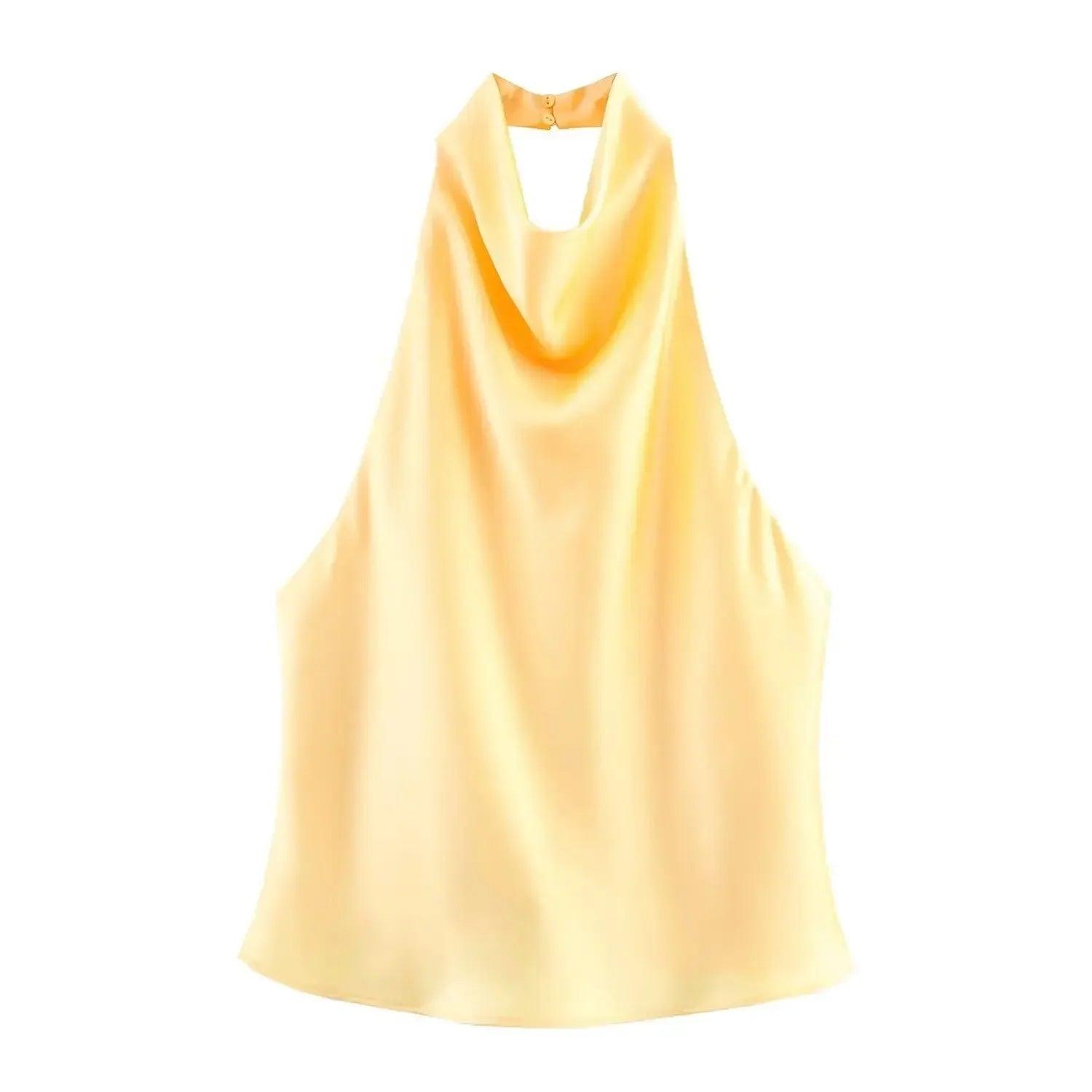 Elegant yellow satin halter neck top for women's fashion, perfect for summer outfits and stylish events.