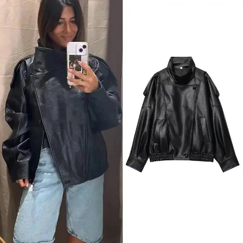Black faux leather women's jacket with puff sleeves, styled with denim shorts for casual fashion