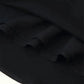 Black women's fashion skirt with ruffled hem detail, soft fabric texture