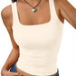 Cream square neck crop tank top with ruched waist, paired with denim jeans and heart pendant necklace
