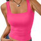 Bright pink women's crop tank top with square neckline, paired with denim jeans and heart pendant necklace