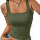 Olive green women's square neck crop tank top with ruched waist, paired with denim jeans and heart pendant necklace