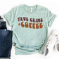 Mint green women's t-shirt with 'True Crime & Coffee' graphic, paired with jeans and white sneakers
