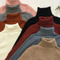 Women's ribbed turtleneck sweaters in assorted colors for fashion and comfort