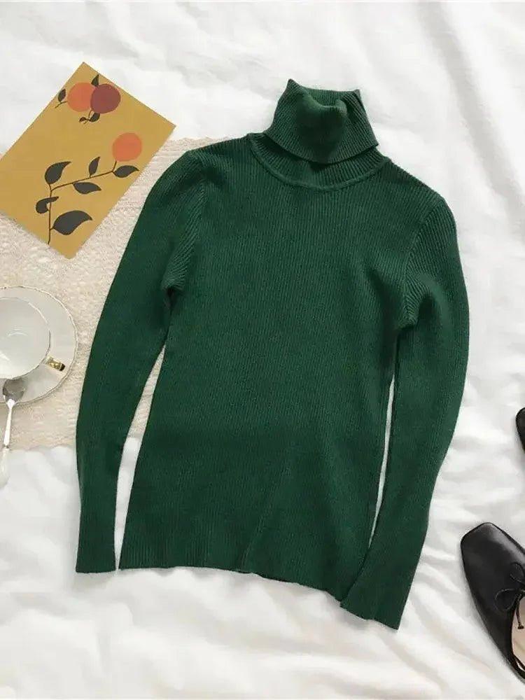 Green turtleneck sweater with cozy aesthetic, styled with tea cup and floral card on white bedding