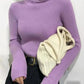 Purple ribbed turtleneck sweater with black pants and cream knit bag, women's fashion outfit