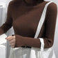 Brown ribbed turtleneck sweater for women, stylish fall fashion top with white pants
