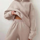 Beige women's cropped hoodie and matching joggers, cozy loungewear set