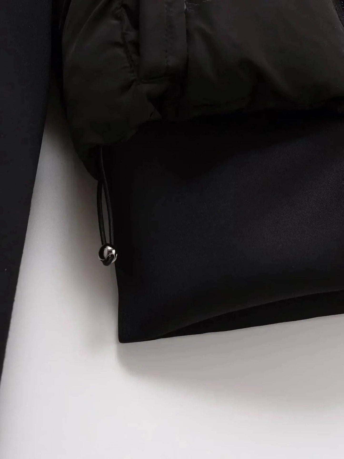 Black puffer jacket with drawstring hem and metallic toggle, women's fashion outerwear
