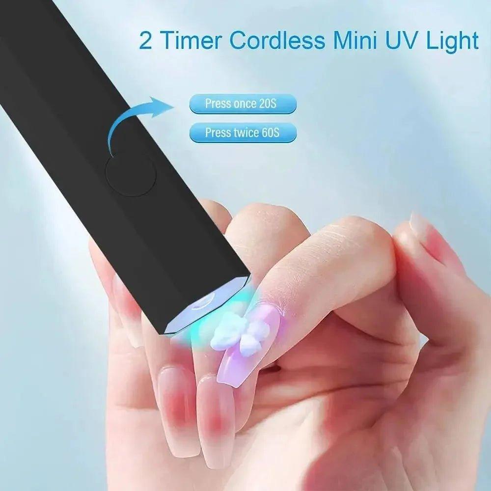 Cordless mini UV nail lamp with 2 timer settings curing gel polish on nails