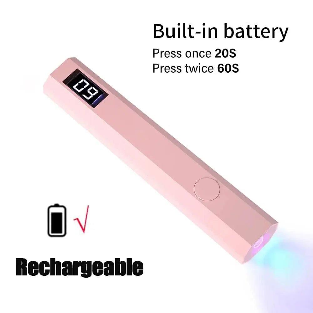 Pink rechargeable UV nail lamp with built-in battery, digital timer, and 20/60s modes for salon-style manicures