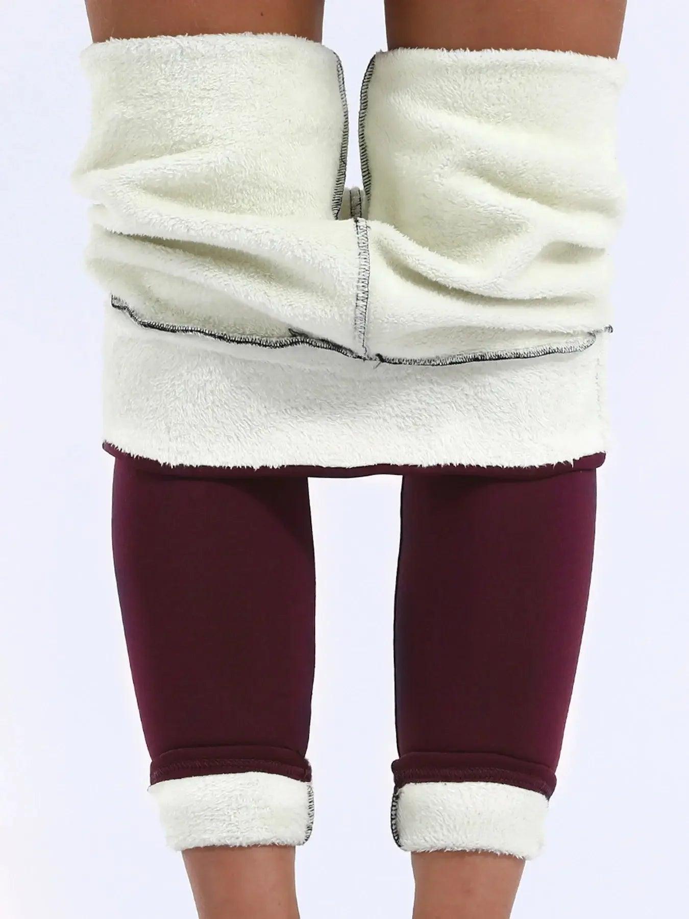 Cozy white fleece-lined burgundy leggings for women, soft and warm fashion wear