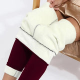 Cozy white fleece-lined burgundy leggings for women, soft thermal wear