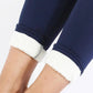 Navy blue women's fleece-lined leggings with cozy white cuffs, perfect for casual fashion and comfort.