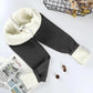 Black women's fleece-lined joggers with cozy white interior, stylish winter fashion
