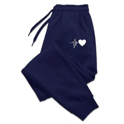 Navy blue women's joggers with white heartbeat heart design, cozy fashion sweatpants