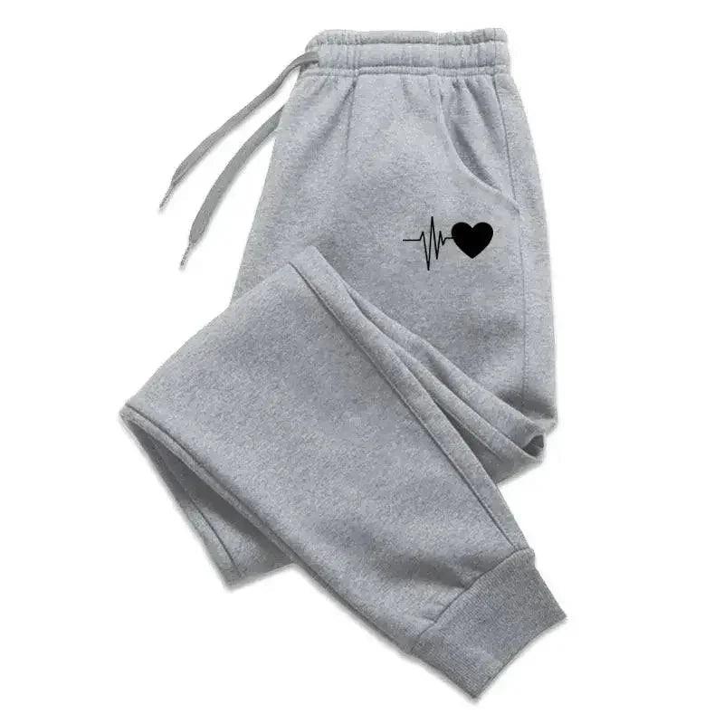 Gray women's joggers with black heartbeat heart graphic, cozy casual sweatpants