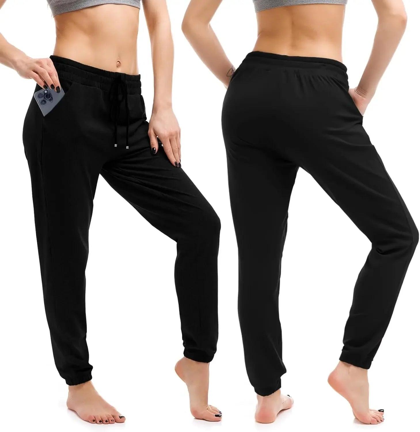 Black women's jogger pants with pockets, drawstring waist, and cuffed ankles for casual or workout wear