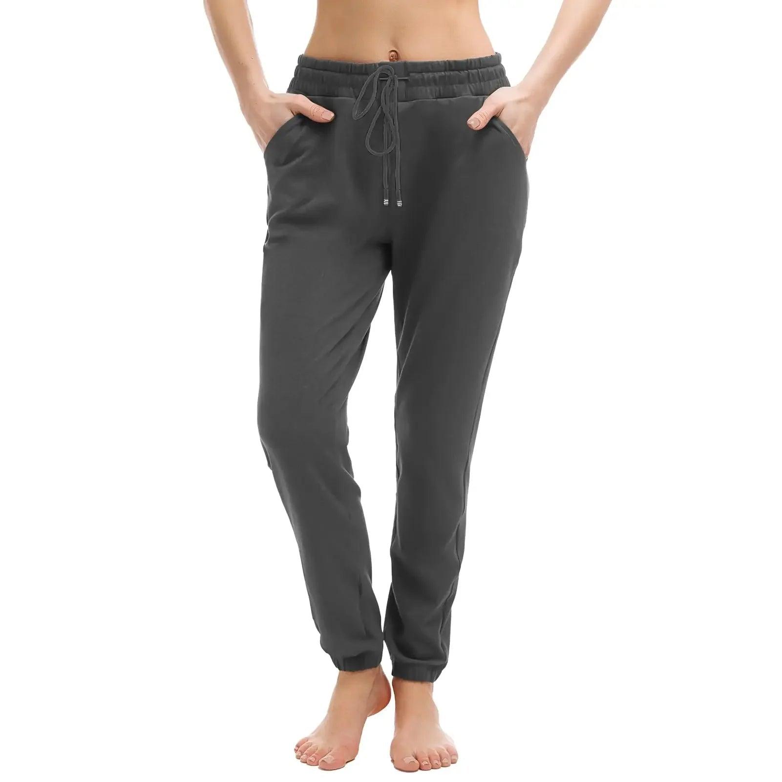 Women's gray jogger pants with drawstring waist and side pockets, casual fashion