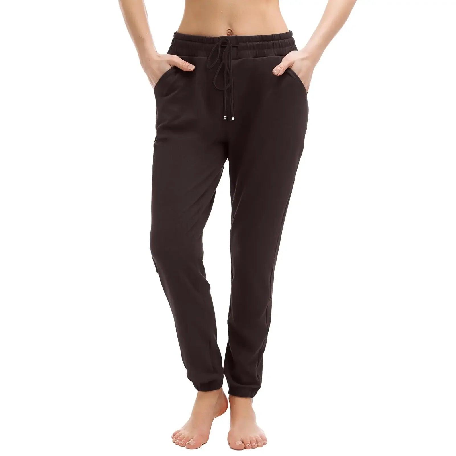 Black women's jogger pants with drawstring waist and side pockets, casual fashion wear