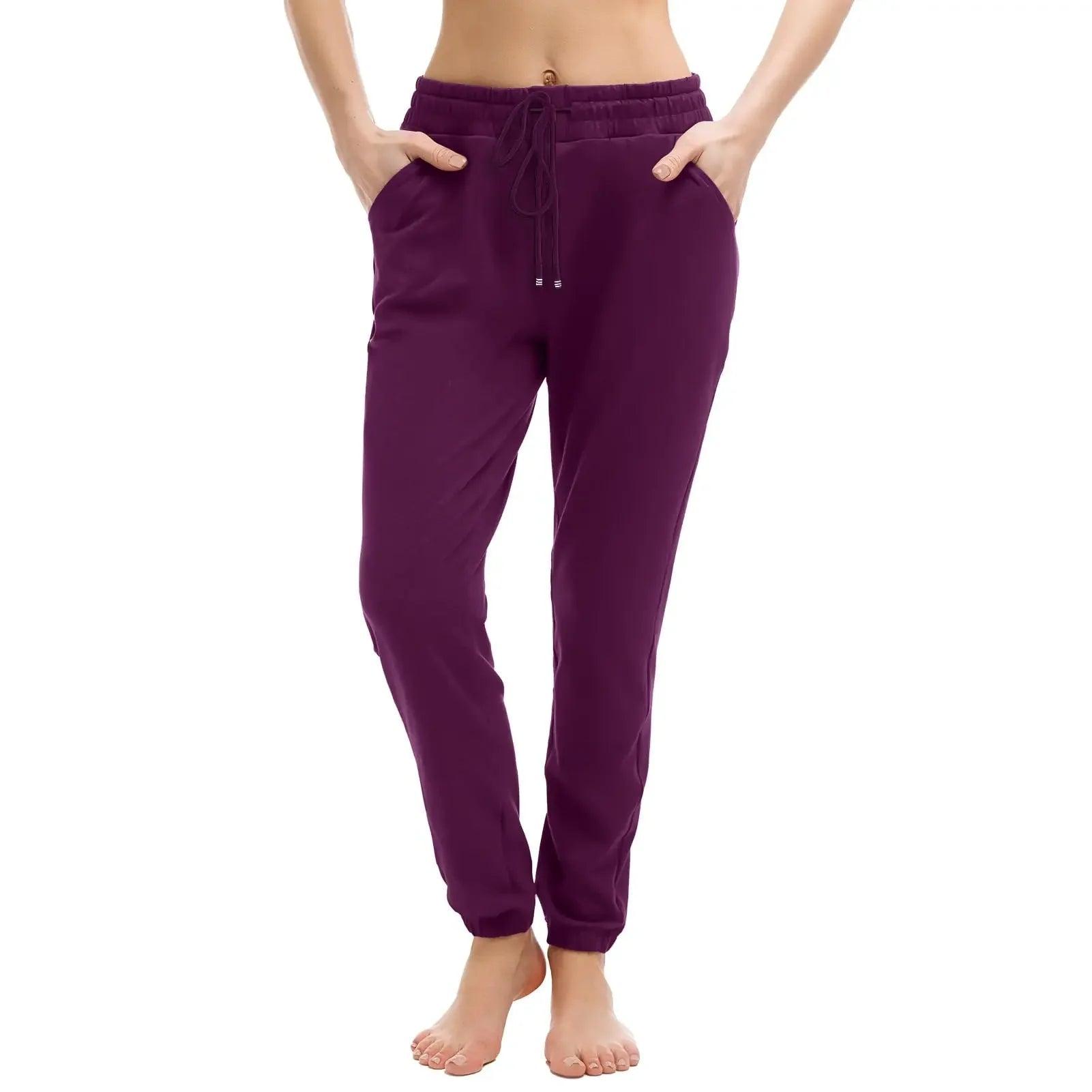 Purple women's jogger pants with drawstring waist and side pockets, casual fashion