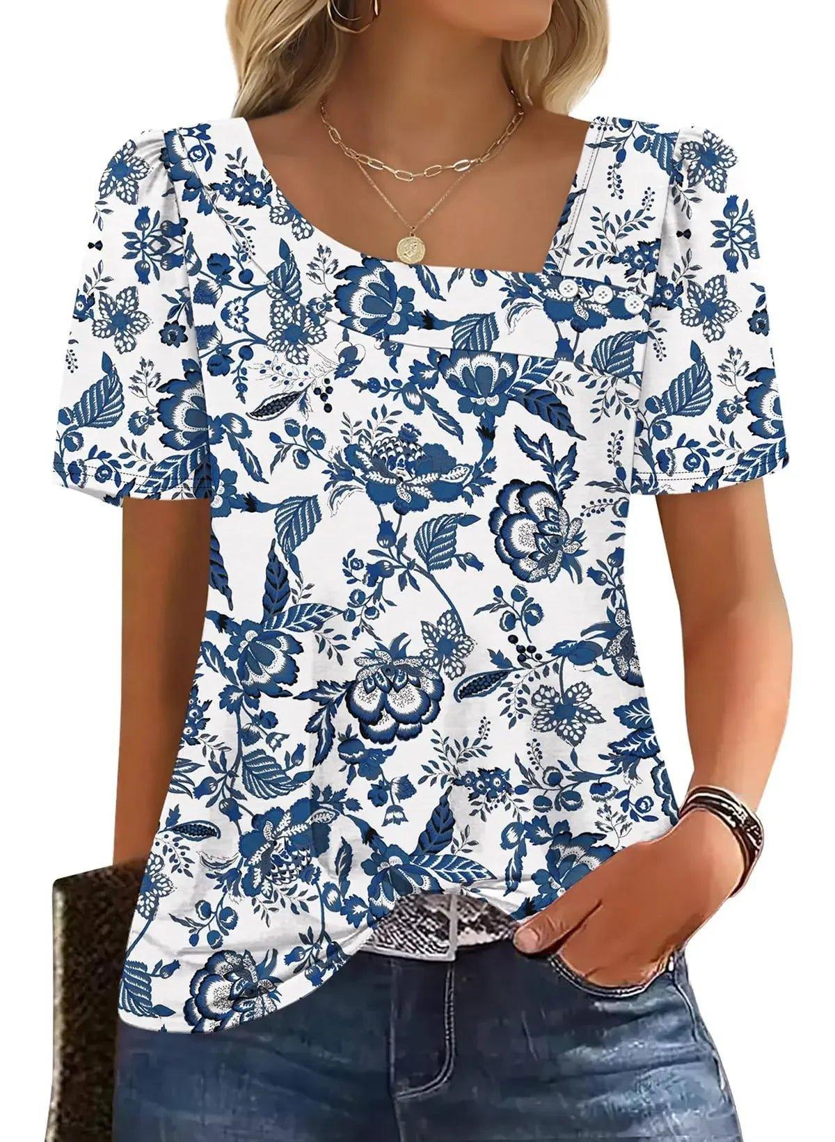 Blue floral print women's blouse with puff sleeves and square neckline, paired with jeans