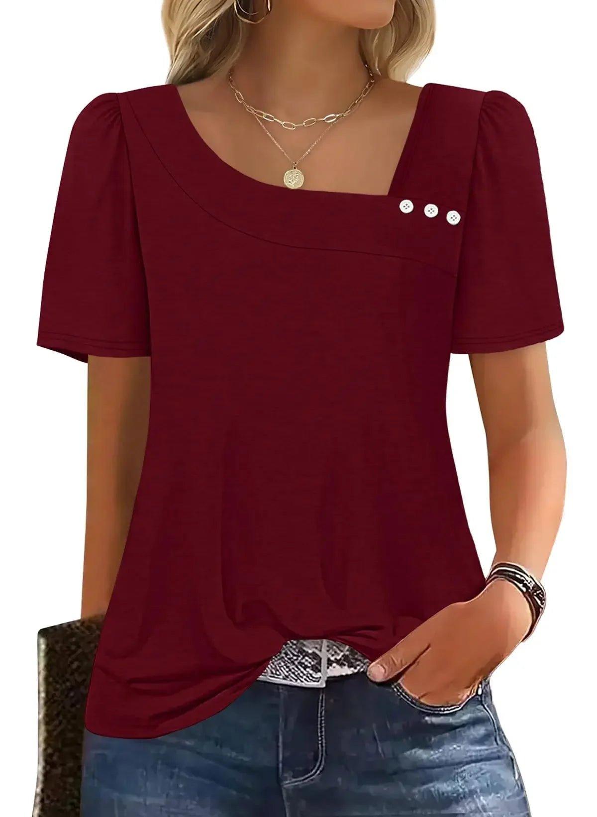 Burgundy women's blouse with puff sleeves, square neckline, and front buttons, paired with jeans for casual fashion.