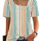 Women's striped short sleeve top with square neckline and button detail, paired with jeans